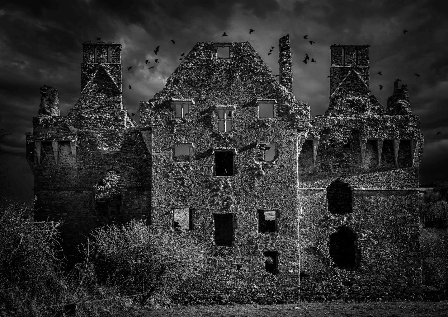 Coppinger's Court: Silent Ruin Historic ruins of Coppinger's Court near Rosscarbery, West Cork, Ireland, beneath dramatic clouds.